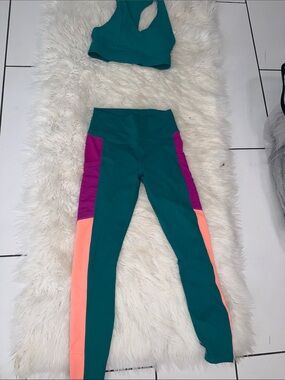Fabletics Teal Leggings with Magenta and Coral Side Panels